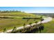 Expansive green space with winding paths and scenic views of the surrounding community at 6250 Grandview Hill Ct, Bradenton, FL 34203