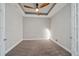 Bedroom boasts tray ceilings and a full-length wall mirror at 6250 Grandview Hill Ct, Bradenton, FL 34203