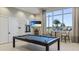 Bright game room with a pool table, a TV, a scenic view, and comfortable seating at 6250 Grandview Hill Ct, Bradenton, FL 34203