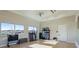 Bright and spacious community gym with free weights, yoga mats and exterior views at 6250 Grandview Hill Ct, Bradenton, FL 34203