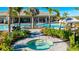 Relaxing hot tub with lush landscaping near the community pool at 6250 Grandview Hill Ct, Bradenton, FL 34203