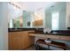 Bathroom featuring vanity with drawers, mirrors, towels and decorative soaps at 6307 Laurel Creek Trl, Ellenton, FL 34222
