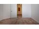 Bedroom featuring neutral walls, carpet flooring, and doorway leading to the adjacent room at 6307 Laurel Creek Trl, Ellenton, FL 34222