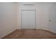 Bedroom featuring neutral walls, carpet flooring and closet with double doors at 6307 Laurel Creek Trl, Ellenton, FL 34222