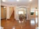 Dining area with decorative columns and staircase at 6307 Laurel Creek Trl, Ellenton, FL 34222