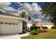 An attractive home with a neatly manicured lawn and convenient two-car garage at 6307 Laurel Creek Trl, Ellenton, FL 34222