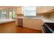 Well-lit kitchen includes stainless steel appliances and ample countertop space at 6307 Laurel Creek Trl, Ellenton, FL 34222