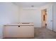 Office area with work desks and an open door leading to the hallway at 6307 Laurel Creek Trl, Ellenton, FL 34222