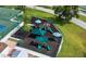 Playground with green slides, climbing structures and shade canopies for a fun recreation area at 6307 Laurel Creek Trl, Ellenton, FL 34222