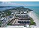 Breathtaking aerial view showcasing beachfront living at 6480 Midnight Pass Rd # 311, Sarasota, FL 34242