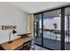 Inviting balcony area with outdoor seating and a view of the pool at 6480 Midnight Pass Rd # 311, Sarasota, FL 34242