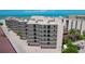 Charming condominium building with balconies and direct beach access at 6480 Midnight Pass Rd # 311, Sarasota, FL 34242