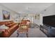 Comfortable living room with open concept and plenty of natural light at 6480 Midnight Pass Rd # 311, Sarasota, FL 34242