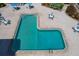 Aerial view of the community pool with brick pavers and seating area at 6480 Midnight Pass Rd # 311, Sarasota, FL 34242