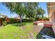 The backyard features a beautiful lawn at 6760 14Th S St, St Petersburg, FL 33705