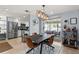 Elegant dining area featuring a modern table, stylish chairs, and an open layout at 6841 Roxbury Dr, Sarasota, FL 34231
