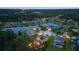 An aerial view of the community with lake views and well-maintained properties at 6907 47Th E Ct, Ellenton, FL 34222