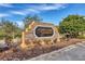 Oakleaf Hammock community entrance sign featuring stone accents and manicured landscaping at 6907 47Th E Ct, Ellenton, FL 34222