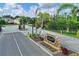 Community entrance showcases manicured landscaping, signage, and a gated entry, emphasizing security and curb appeal at 6907 47Th E Ct, Ellenton, FL 34222