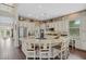 Spacious kitchen with a large island, granite countertops, and stainless steel appliances at 6907 47Th E Ct, Ellenton, FL 34222