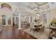 Formal dining and living room featuring hardwood floors and natural light at 6907 47Th E Ct, Ellenton, FL 34222