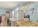 Bright room with dual vanities, blue walls, and built-in shelving at 710 Beverly Rd, Venice, FL 34293