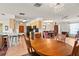 Bright kitchen with dining area, and open floor plan with a decorative chandelier at 710 Beverly Rd, Venice, FL 34293