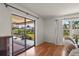A screened patio with access to the backyard and plenty of space for outdoor seating at 710 Beverly Rd, Venice, FL 34293