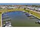 Scenic aerial view of the community marina offers convenient boating access for residents at 714 N Waterway Dr, Venice, FL 34285