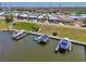 Aerial view of community highlighting waterfront location, marina and surrounding homes at 714 N Waterway Dr, Venice, FL 34285