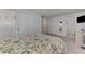 This bedroom boasts an adjoining room, and closet space at 714 N Waterway Dr, Venice, FL 34285
