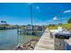 Community marina with boat docks and a convenient utility station for boat maintenance at 714 N Waterway Dr, Venice, FL 34285