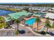 Aerial view of the community pool and recreational facilities near the marina at 714 N Waterway Dr, Venice, FL 34285