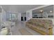An open living room with nice views, and comfortable furniture at 714 N Waterway Dr, Venice, FL 34285
