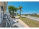 Comfortable patio seating with a scenic view of the waterfront community at 714 N Waterway Dr, Venice, FL 34285