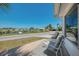 Cozy patio offers comfortable seating with views of the surrounding waterfront community at 714 N Waterway Dr, Venice, FL 34285