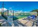 This pickleball court area offers shade and tables for a comfortable playing experience at 714 N Waterway Dr, Venice, FL 34285