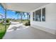 Inviting porch with ample space to relax, enjoy the community views and nearby water at 714 N Waterway Dr, Venice, FL 34285