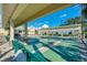 Shuffleboard courts with benches on the side, perfect for friendly competitions and outdoor fun at 714 N Waterway Dr, Venice, FL 34285