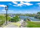 Beautiful waterfront community view with boat docks and lush landscaping at 714 N Waterway Dr, Venice, FL 34285