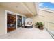 Secluded outdoor patio with a lounge seat at 76 Tidy Island Blvd, Bradenton, FL 34210