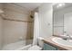 Cozy bathroom featuring a shower-tub combo, toilet and a vanity sink at 7832 Panther Ridge Trl, Bradenton, FL 34202
