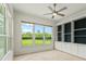 Office features large windows with nature views and custom built-in shelving at 7832 Panther Ridge Trl, Bradenton, FL 34202