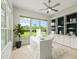 Bright home office with a built-in bookcase and a large window with scenic views at 7832 Panther Ridge Trl, Bradenton, FL 34202
