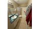 Modest bathroom featuring a shower-tub combination and a single sink vanity at 815 12Th W Ave, Bradenton, FL 34205
