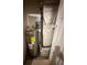 A utility closet shows the furnace, water heater, and ductwork at 815 12Th W Ave, Bradenton, FL 34205