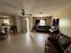 Comfortable living room features neutral walls, tile flooring, and natural light from windows at 815 12Th W Ave, Bradenton, FL 34205