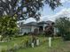 Charming single-story home with lush landscaping and well manicured lawn at 817 Tallgrass Ln, Bradenton, FL 34212
