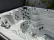 Inviting hot tub featuring multiple jets, contoured seating, and modern design elements for ultimate relaxation at 817 Tallgrass Ln, Bradenton, FL 34212
