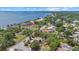 An aerial view of a home and community near a waterfront at 8255 Longbay Blvd, Sarasota, FL 34243
